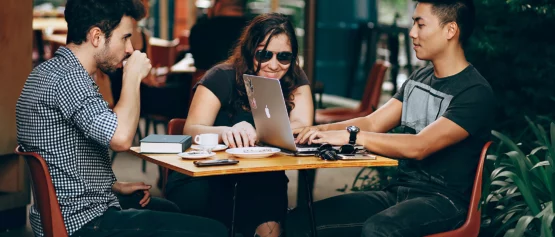 Trusted WiFi shortlisted for Glotel Awards 2023 groupf of people sitting in a cafeteria using wi fi